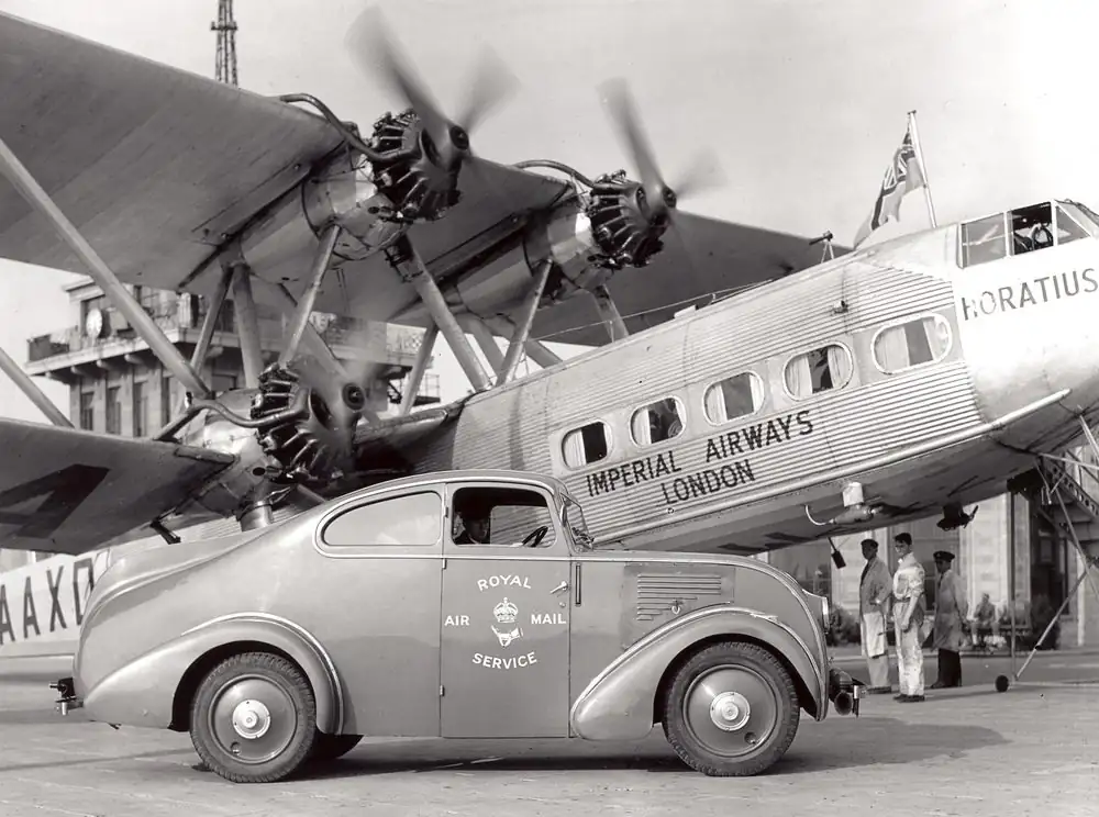 Vintage Royal Air Mail van beside an Imperial Airways airliner, the airmail heritage behind Skypost file transfer